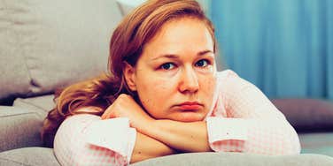 sad woman recovering from childhood problems with her parents