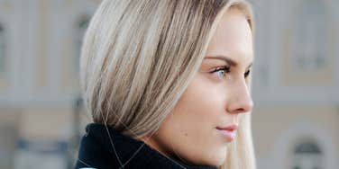 Charming woman has a dark trait.