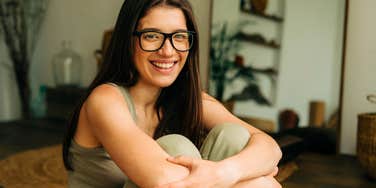 highly intelligent woman smiling and thinking