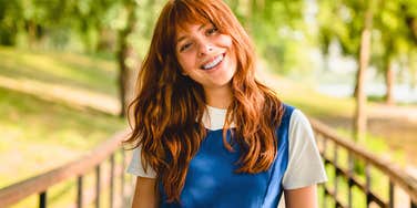 gen z woman smiling using slang young people say