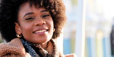 smiling compassionate woman with good intentions and a pure heart