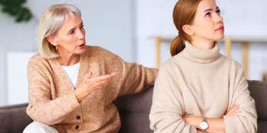mother speaking negatively to her daughter who is ignoring her
