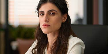 Seriously toxic boss being extremely stern in her office 