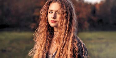 spiritually gifted woman with long hair feeling free