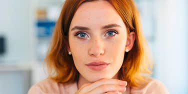 confident woman on her own not fitting into any group