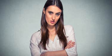 Aggressive young woman who had weak parents 