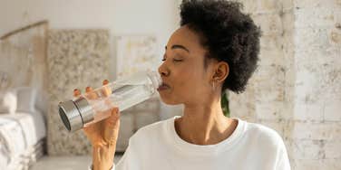 woman asks house cleaner discount used sink fill water bottle