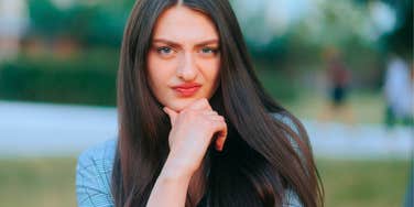 woman who is exceptionally hard to manipulate listening to phrases she knows are not ok