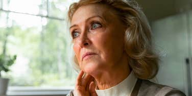 sad woman who has little respect for herself thinking at home