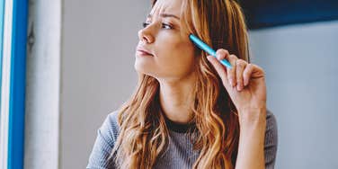 woman trying to remember something