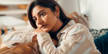 sad depressed woman mourning the loss of a close loved one