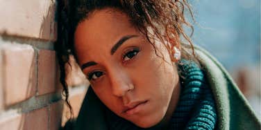 Woman shows signs of depression.