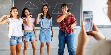 teacher filming her students to post online