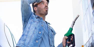 man shocked by gas prices