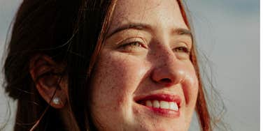 Happy woman releases shame.