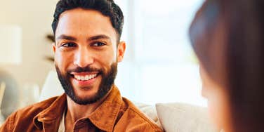 introverted man opening up to woman in conversation