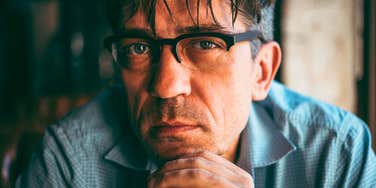 manipulative man thinking about to respond in conversation