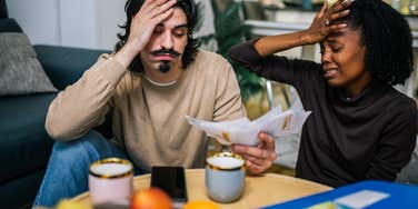 middle class couple worried about money