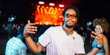 millennial man at a concert