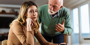 woman being yelled at by father realizing her family doesn't care about her
