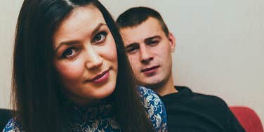 couple in miserable marriage sitting together
