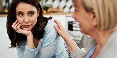 Woman who wants another woman to think she's listening but looks dubious