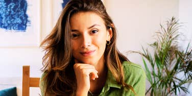 A professional woman looking composed and productive; illustrating the 'strategic prioritization' and focused mindset that psychologists identify as the primary marker of highly intelligent and efficient workers.