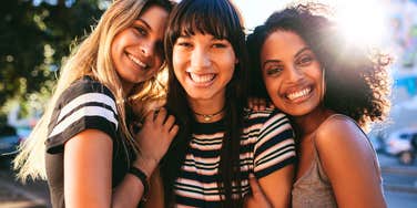 women with her two good friends having a peaceful time