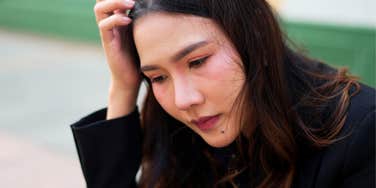 exhausted woman who is tired of her life thinking deeply