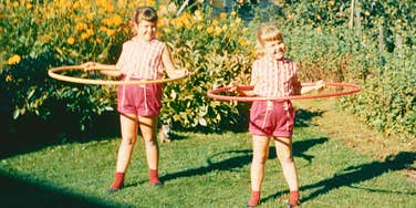 1960s kids hula-hooping as a fun hobby