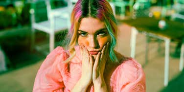 unique rebellious woman ignoring things everyone likes