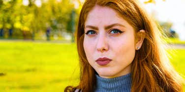 woman who seems mean and awful staring seriously