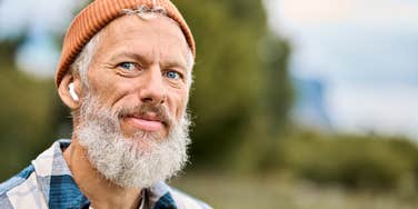 Generation Jones man in his 60s who is too cool to be a boomer