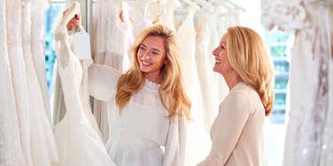 mother and daughter from different generations shopping for a wedding dress