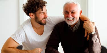 Father spending quality time with his son in a warm, supportive moment that highlights how strong parent-child bonds are maintained over time