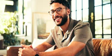 high-value man relaxing at home 