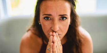 middle aged woman feeling lonely and unsure