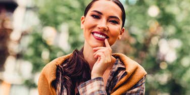woman wise beyond her years thinking deeply outside