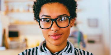 mentally strong woman smiling listening to music