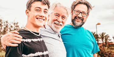 Three generations of parents and adult kids who treat each other well 