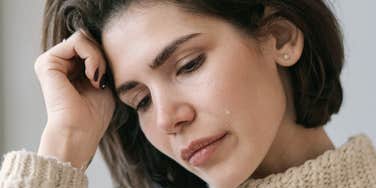 Woman really struggling but doesn't want anyone to know