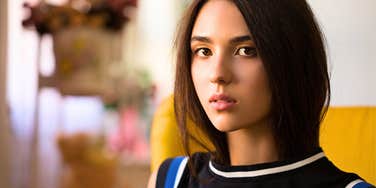 woman who lies a lot staring seriously