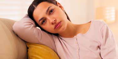 woman struggling as an adult from her critical parents