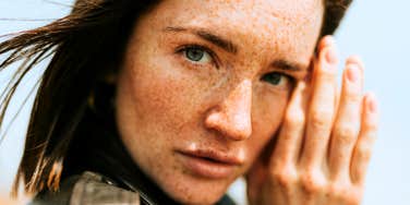 intelligent woman with a deep heart looking sad