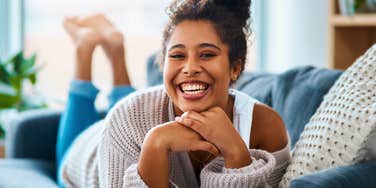 happy woman who left her phone in another room on purpose