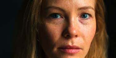 serious woman losing herself to her sadness