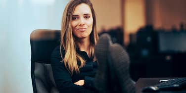 Entitled woman looking arrogant at work 