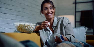woman rewatching her favorite tv show