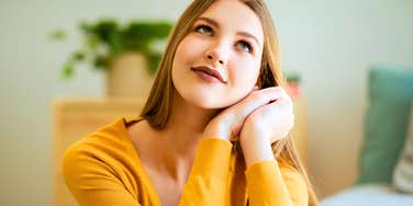 fake inauthentic woman thinking about superficial things