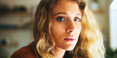 miserable woman about to speak to someone